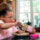 Illustration for article titled Why do peanut butter jars have those hard-to-scrape rims?